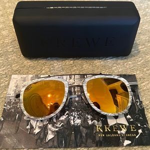 Krewe Breton yellow flash lens sunglasses.